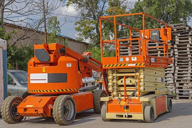 forklift transporting boxes in a busy warehouse in Aguanga, CA